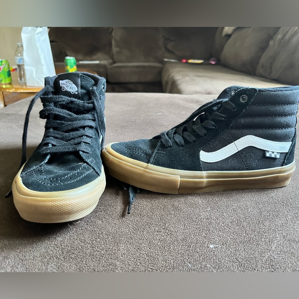 Vans high top sneakers, never worn still have the original box.
